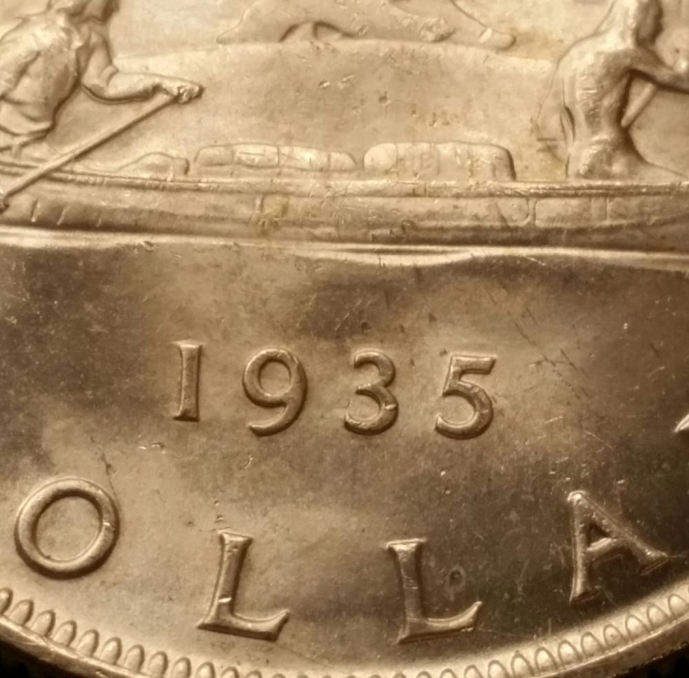 1935-Canadian-Silver-Dollar-For-Grade.
